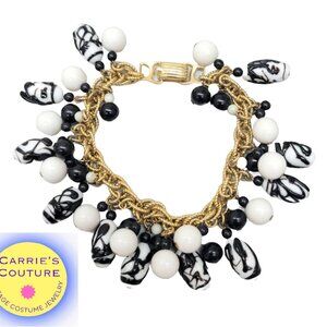 Vintage Signed Napier Book Piece Zebra Bead Charm Bracelet, 1967